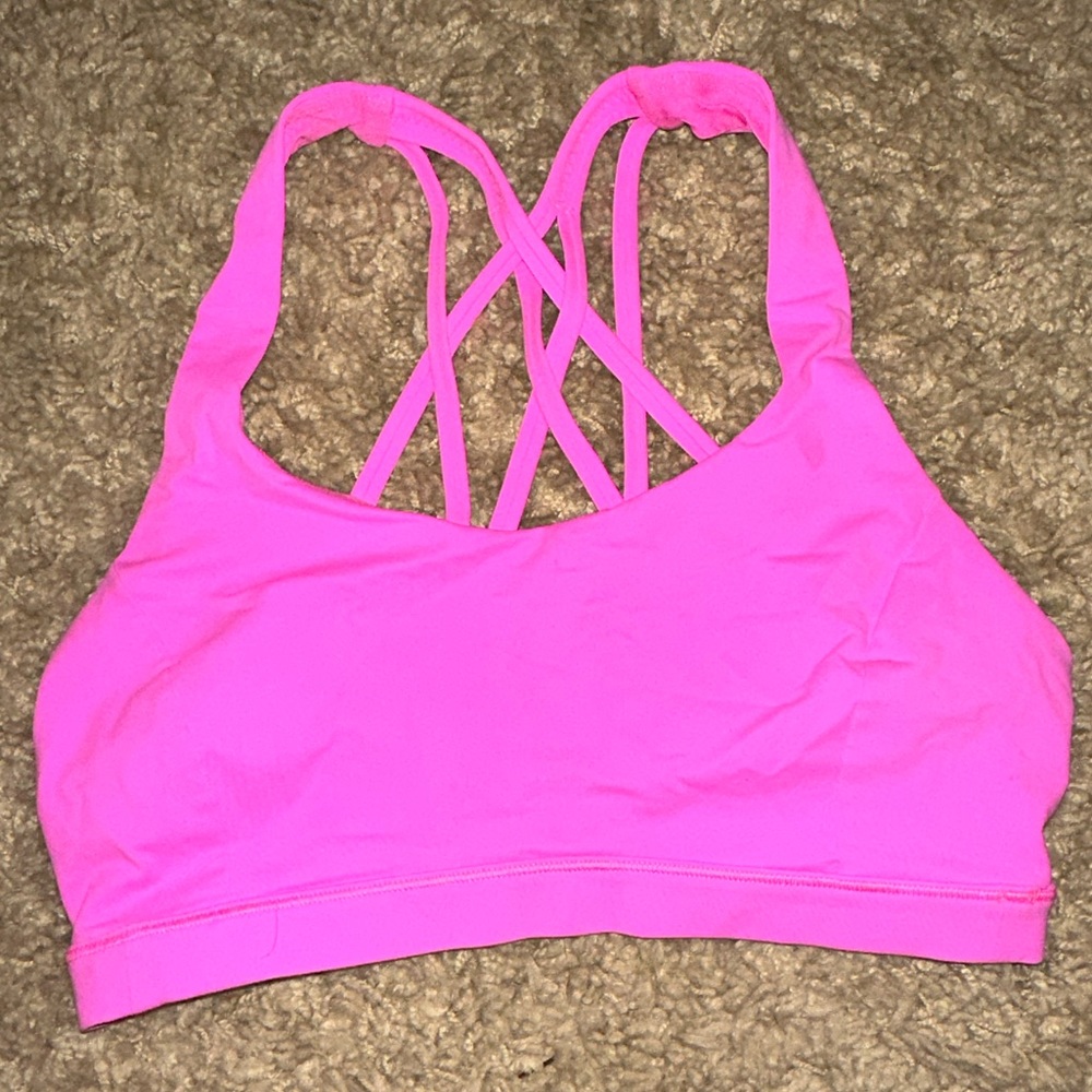 Neon pink Lululemon energy bra. Good condition. Doesn’t come with bra pads.